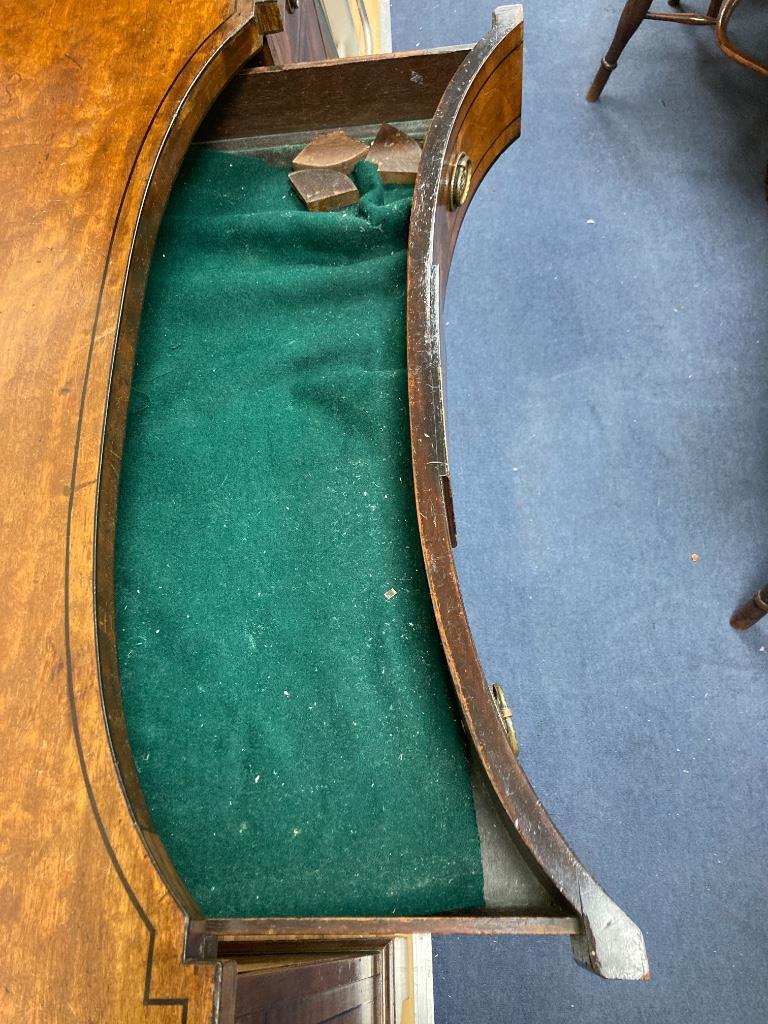 A George IV ebony banded concave front mahogany sideboard, length 173cm, depth 60cm, height 92cm